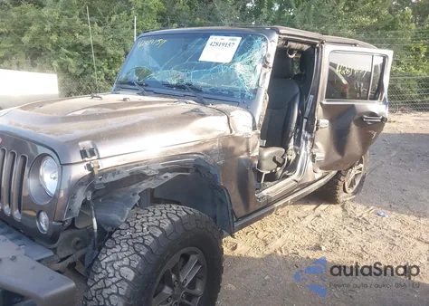 2016 Jeep Wrangler Unlimited Sahara z USA, uszkodzony, nr VIN 1C4BJWEG7GL322433